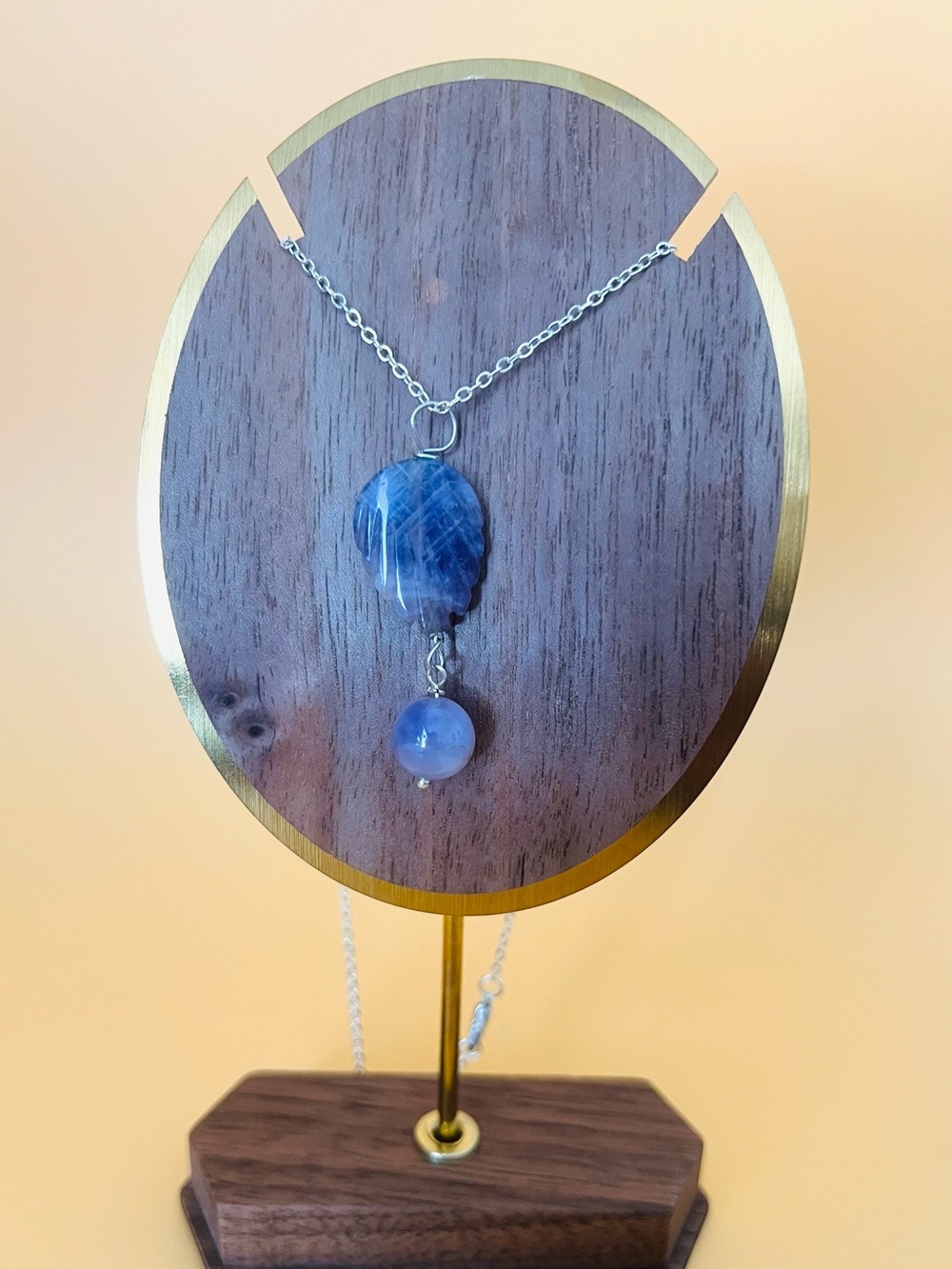 Carved amethyst pendant leaf design set in silver